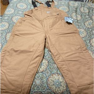 Carhartt FR double insulated construction bibs. Zippered legs. NFPA. Never worn